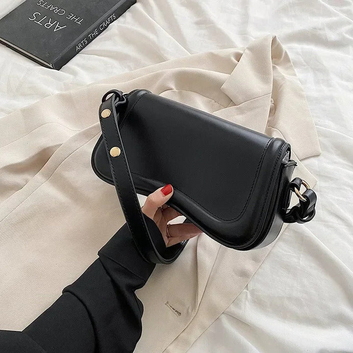 Sac à main en cuir vegan à rabat ondulé Cadence